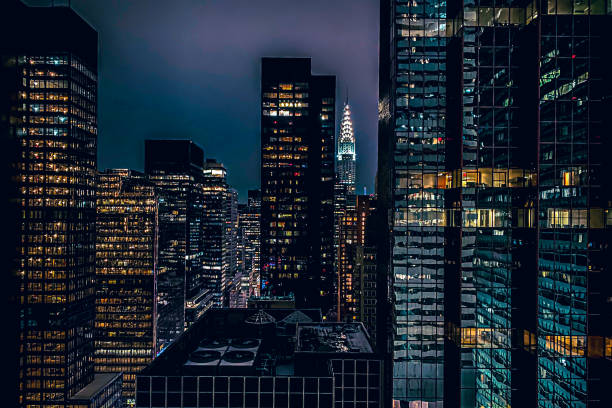 Manhattan at night Manhattan at night from above skyscraper office building built structure new york city stock pictures, royalty-free photos & images