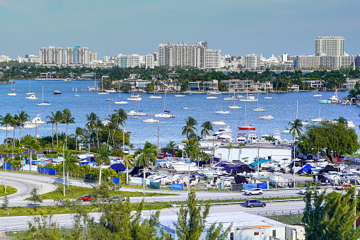 Beautiful aerial panoramic view of the city of Miami, its buildings, marina, yachts and luxurious suburbs houses