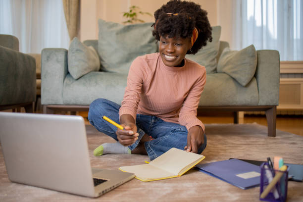 istock Young woman working from home 1452799474