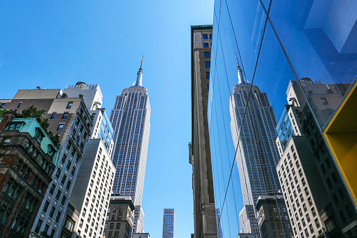 Manhattan on clear sky day with reflection