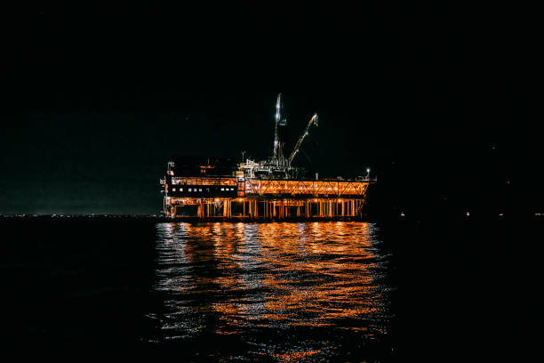 istock Dramatic Lighting on an Oil Rig at Night in the Pacific Ocean 1452806059