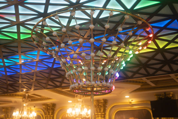 istock Modern pendant lights bulbs hanging on restaurant, bottom view. Close-up of interior design decoration background 1452807582