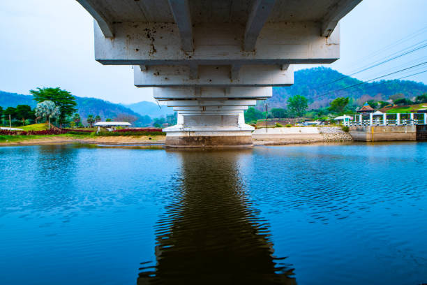 Thachompoo bridge or white bridge with country view in Lamphun province, Thailand.