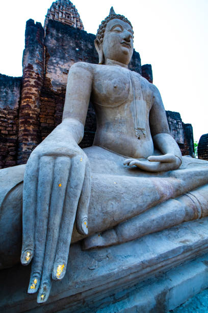 Ancient Buddha statue in Phra Si Ratana Mahathat Chaliang temple, Thailand.