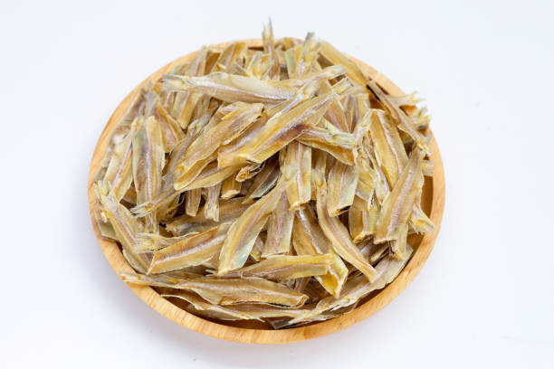 istock Dried anchovy on white background. 1452812517