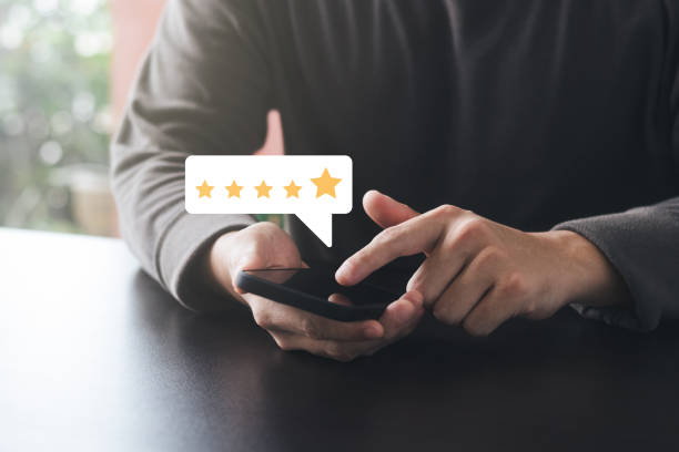 Satisfaction Survey Concept Reviews Customer Quality Assessment, Customer Rating on Smartphone, Service or Product Rating, 5 Star Rating. stock photo