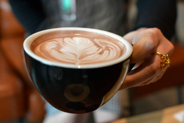 istock Hot coffee in the cup, smoke above the coffee 1452821207