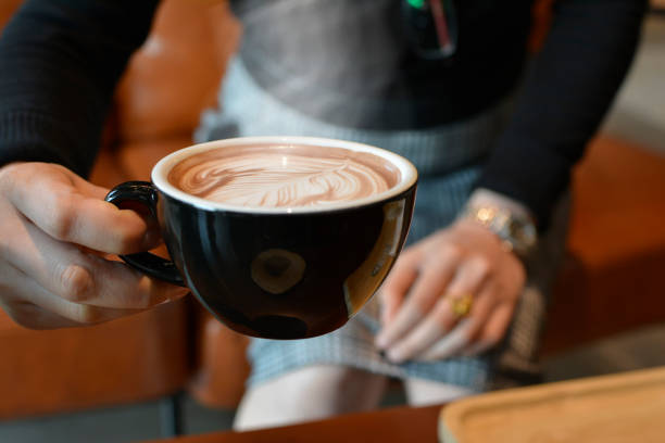istock Hot coffee in the cup, smoke above the coffee 1452821230