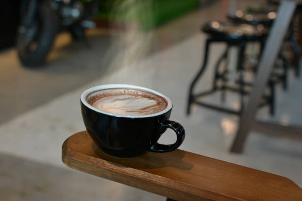 istock Hot coffee in the cup, smoke above the coffee 1452821231