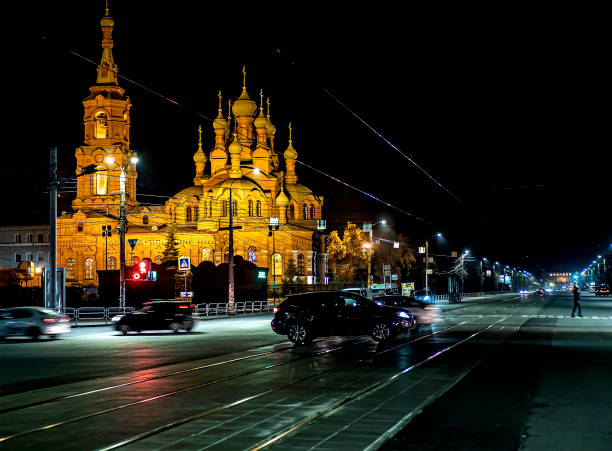 night view of the building of the Church of the Holy Trinity on Kirov Street on an autumn evening in Chelyabinsk, against the background of a fantastic dark blue sky