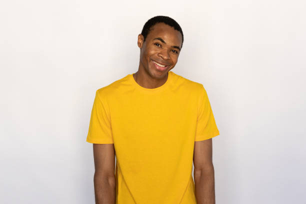 istock Portrait of happy young man looking at camera and smiling 1452829502