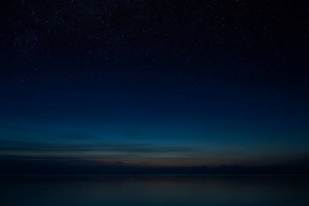istock The Twilight sky with star at the lake. 1452834539