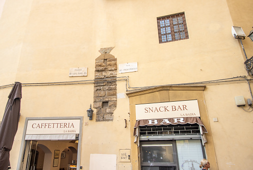 Snack bar and cafe with people on Piazza di San Firenze at Florence in Tuscany, Italy