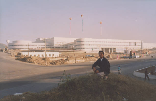 istock 1990s Chinese Men Real Life Old Photo 1452836819