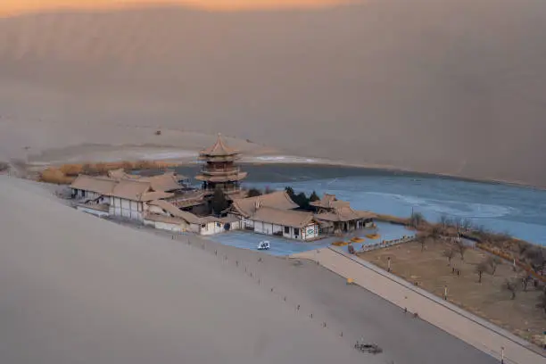 An aerial view of the Dunhuang city on the shore of the Crescent Lake