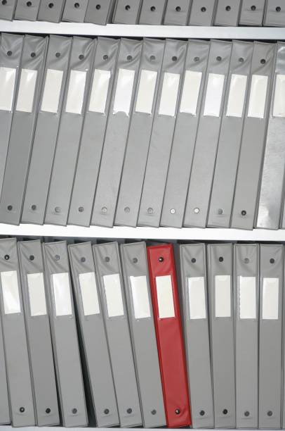 istock Vertical semi-grayscale shot of archival storage of documents 1452839116