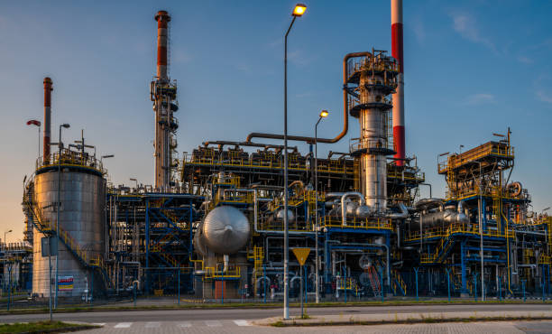 istock Oil refinery in the light of the setting sun 1452840502