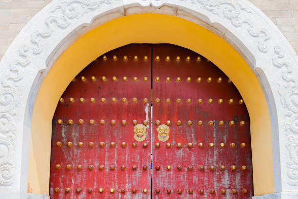 istock Chinese red door with copper lion 1452842103