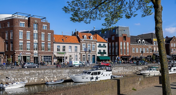 Roermond, Netherlands – April 15, 2022: A closeup of boats on the River de Roer in Roermond, Netherlands