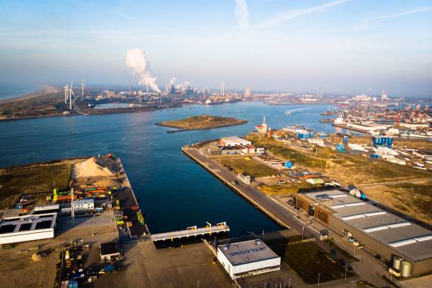 bird's eye view of the port of ijmuiden with tata steel factories in velsen-noord, the netherlands - ijmuiden imagens e fotografias de stock