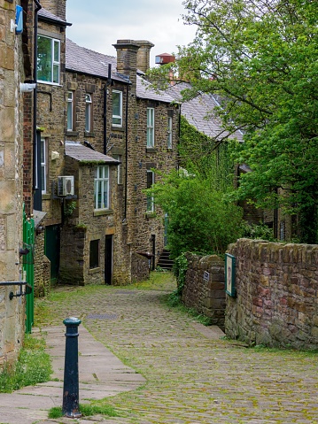 cobbled lanes behind old stone built houses New Mills Derbyshire