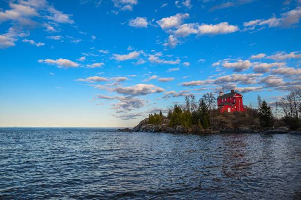 istock Red Lighthouse in a Sea of Blue 1452850862