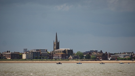 A view of Harwich from the sandy beach in Shotley Gate, Suffolk, UK