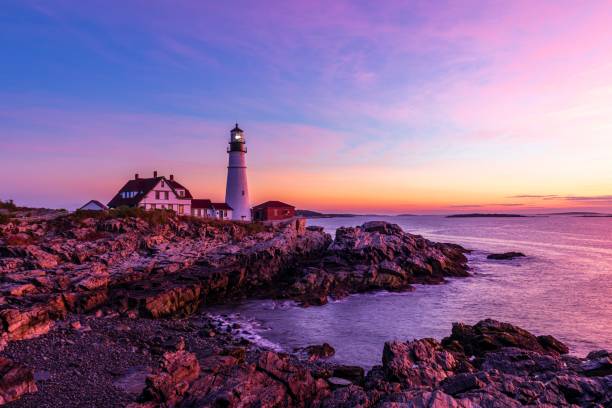 istock Beautiful view of a lighthouse with a sunset sky background 1452852982