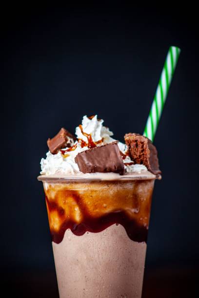 istock Vertical shot of a milkshake with a dark background 1452853329