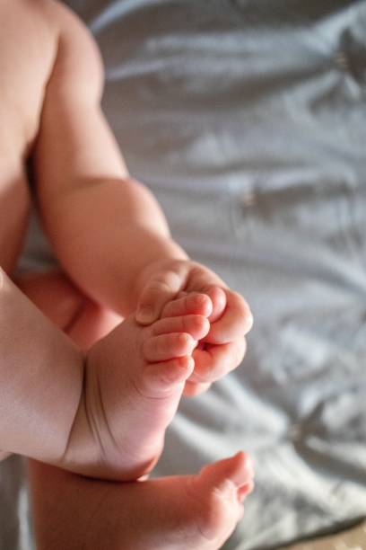 istock Sweet baby toes at bedtime 1452853537
