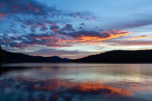 istock Scenic view of the clouds reflected in the lake during sunset 1452854626