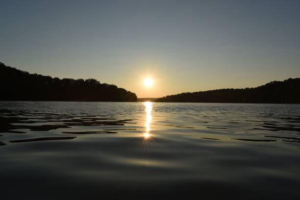 istock Scenic seascape before sunset with the sun reflected in the water 1452854657