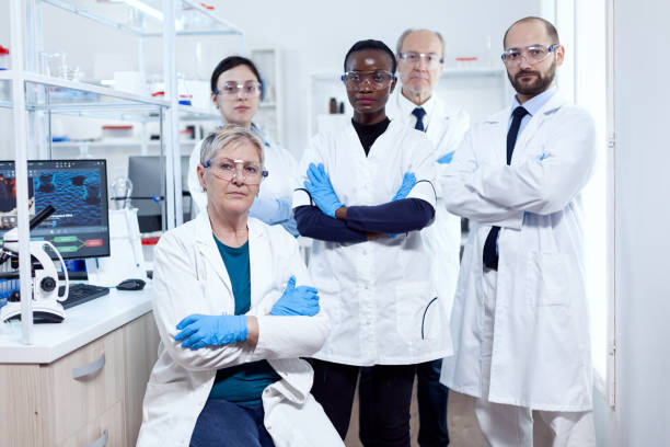 istock Team of professional scientists standing together 1452860067
