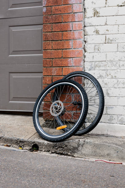 istock Abandoned pair of bicycle wheels 1452860227