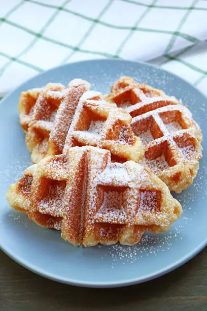 Photo of Plate of Delectable Croffles or Croissant Waffle Sprinkled with Icing Sugar