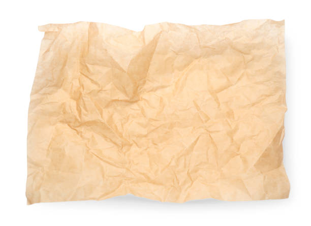 白い背景にしわくちゃの茶色のベーキングペーパーのシート、上面図 - sheet paper messy white ストックフォトと画像