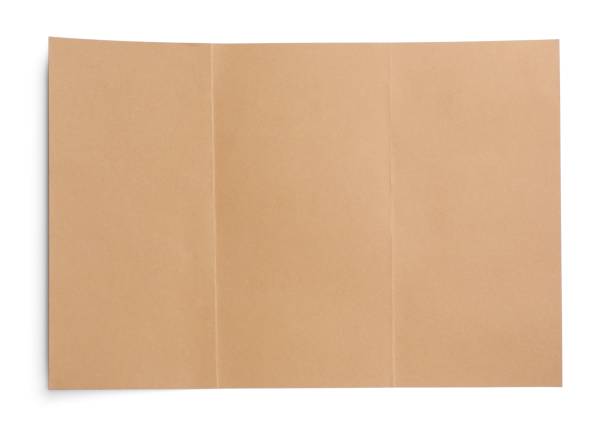 istock Sheet of brown paper on white background, top view 1452861798