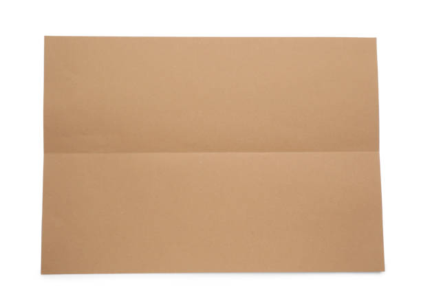 istock Sheet of brown paper on white background, top view 1452861839