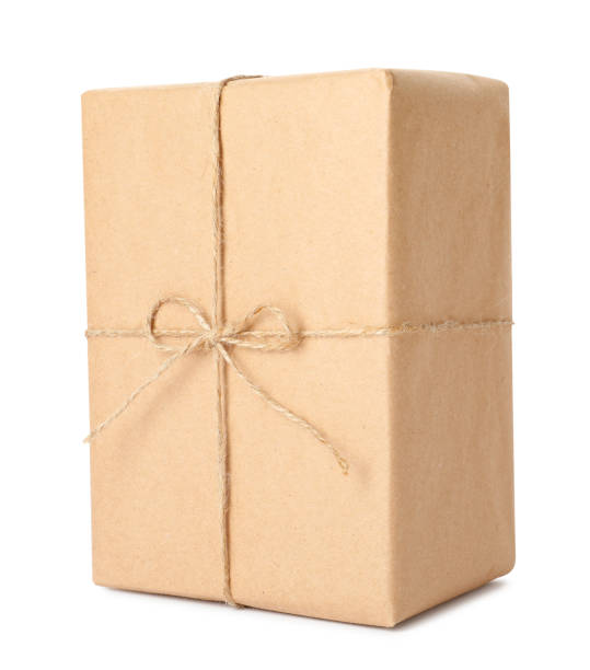 istock Parcel wrapped with kraft paper and twine isolated on white 1452861934