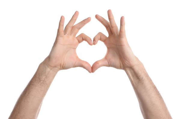 istock Man making heart with hands on white background, closeup 1452867094