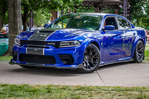 Des Moines, IA - July 03, 2022: Low perspective front corner view of a 2020 Dodge Charger SRT Hellcat Widebody at a local car show.