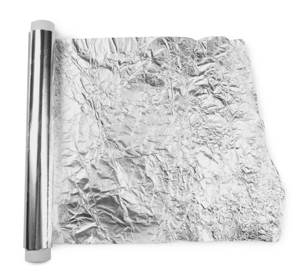 istock Roll of aluminum foil isolated on white, top view 1452868759