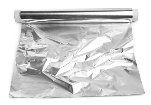 istock Roll of aluminum foil isolated on white 1452868875