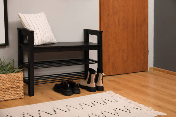 istock Modern hallway interior with shoe rack near door 1452869140