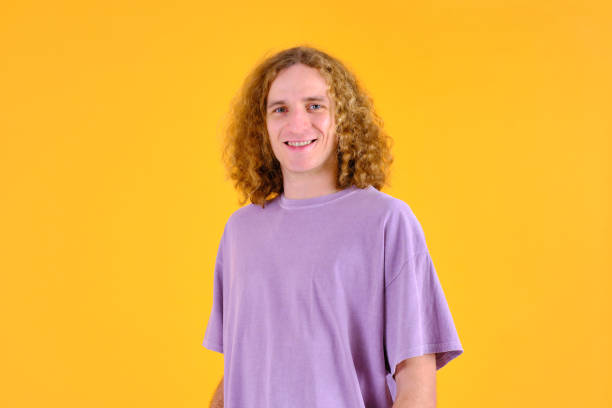 istock middle shot of a young man looking at the camera and smiling 1452874614