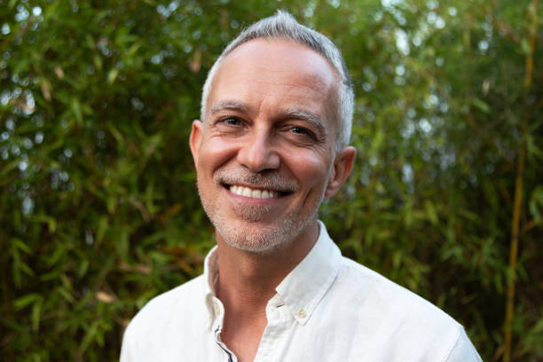 istock Horizontal headshot of smiling white man in nature. 1452877368