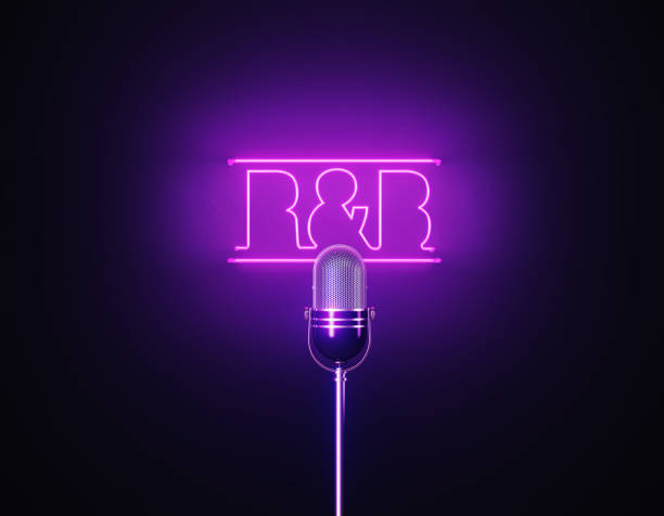 istock Purple Neon Light Writes R&B Above A Silver Colored Microphone Over Black Background 1452877563