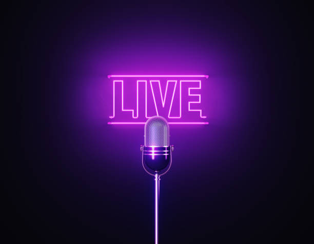 istock Purple Neon Light Writes Live Above A Silver Colored Microphone Over Black Background 1452877579
