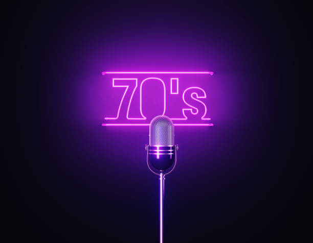 istock Purple Neon Light Writes 70's Above A Silver Colored Microphone Over Black Background 1452877614
