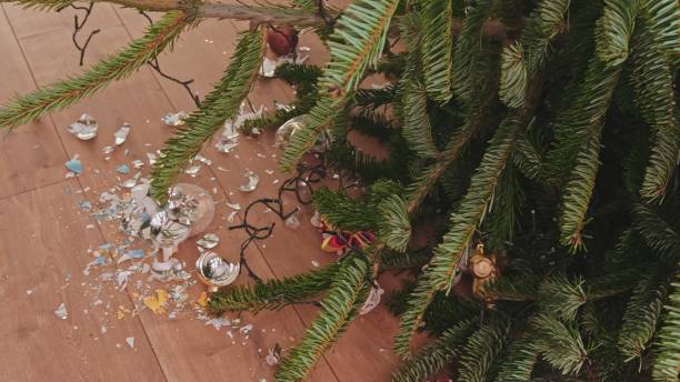 istock Broken Glass Baubles Decorations from Fallen Over Christmas Tree 1452880508